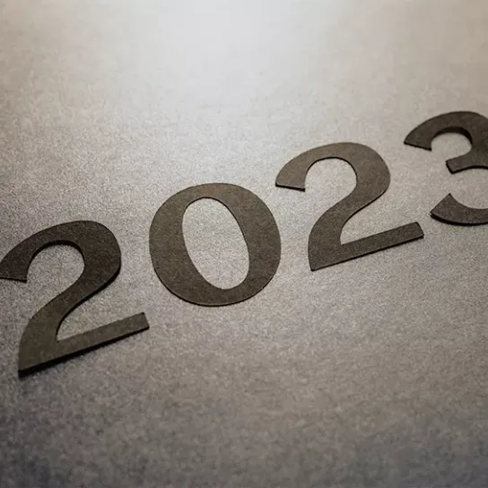 2023 written in black.